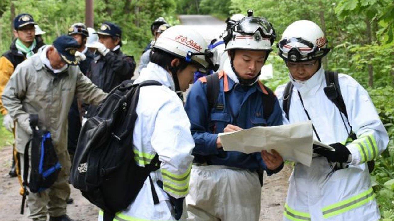 Rescue workers in Japan search for 7-year-old left in forest