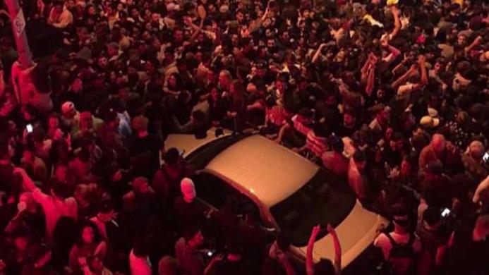Fans flood streets after Kanye West announced pop-up concert