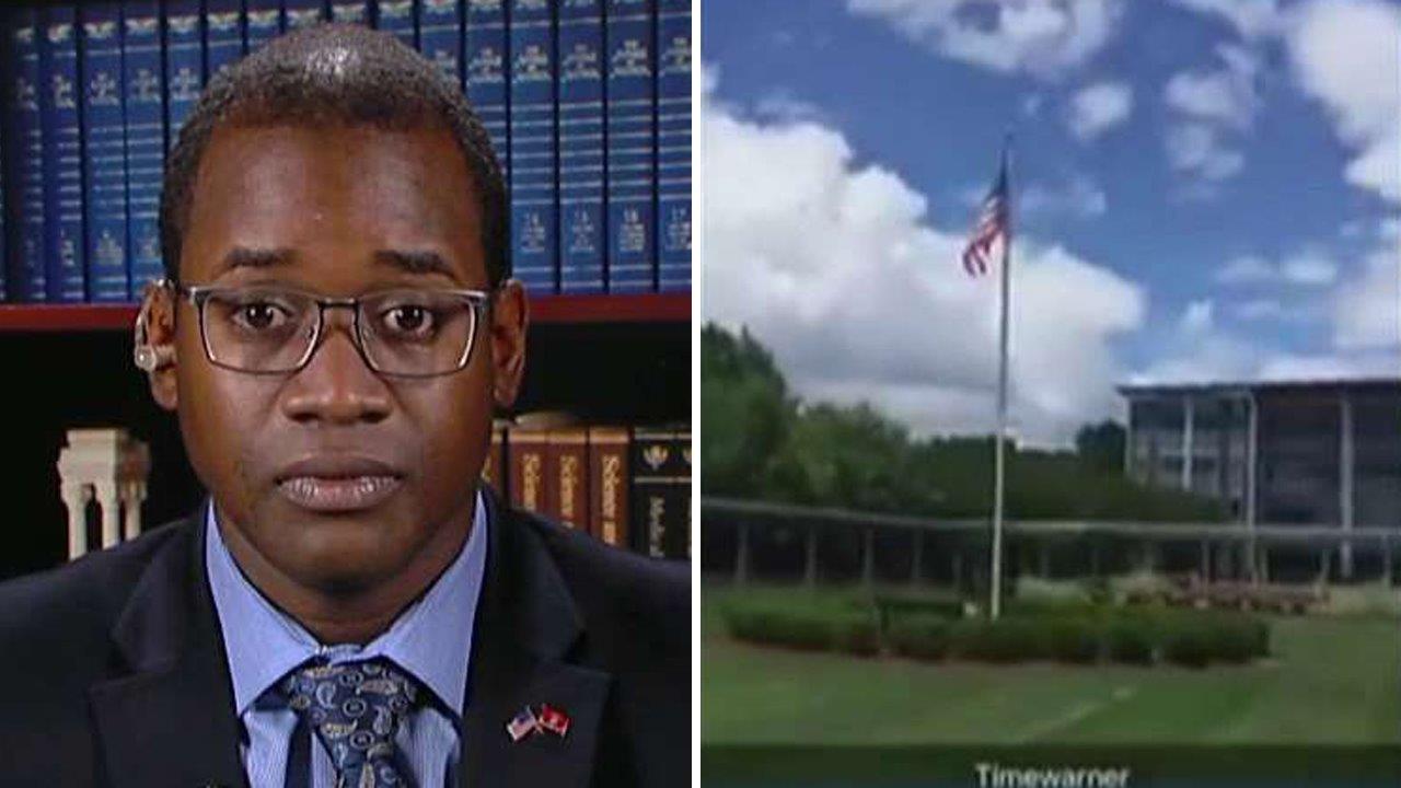 Vet says he was fired for lowering the flag on Memorial Day