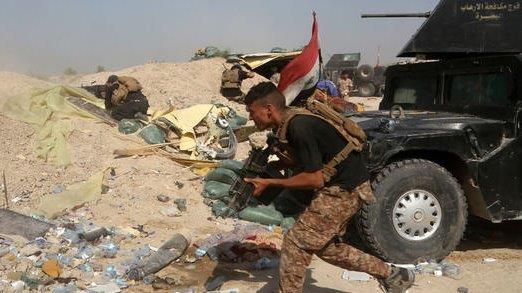Kerusuhan di kalangan pasukan keamanan Irak memperlambat kemajuan dalam serangan terhadap Fallujah yang dikuasai ISIS
