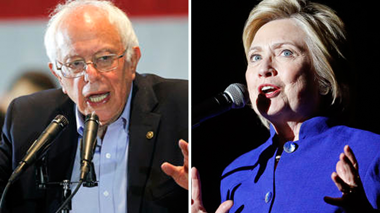 Sanders refusing to bow out despite Clinton making history