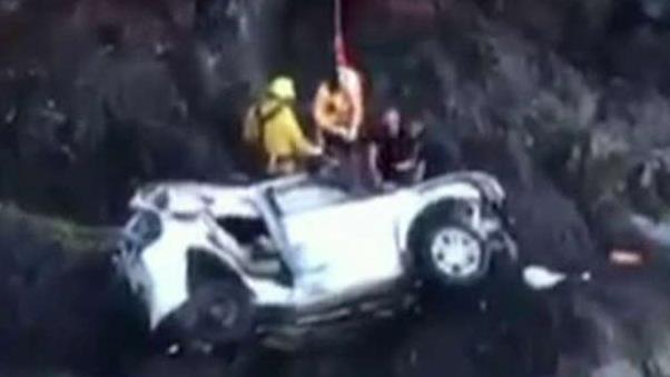Woman accused of killing twin by driving off cliff