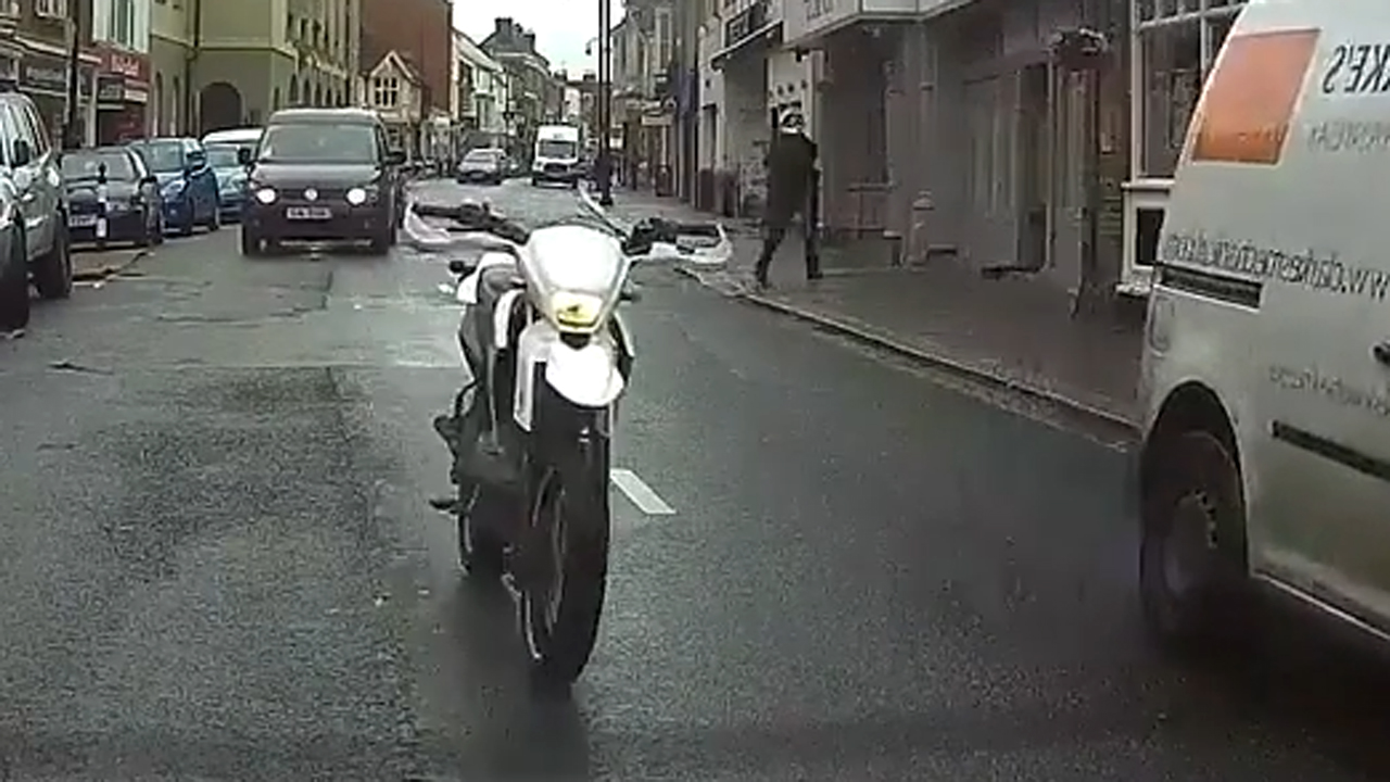 Ghost rider? Dashcam catches riderless motorcycle