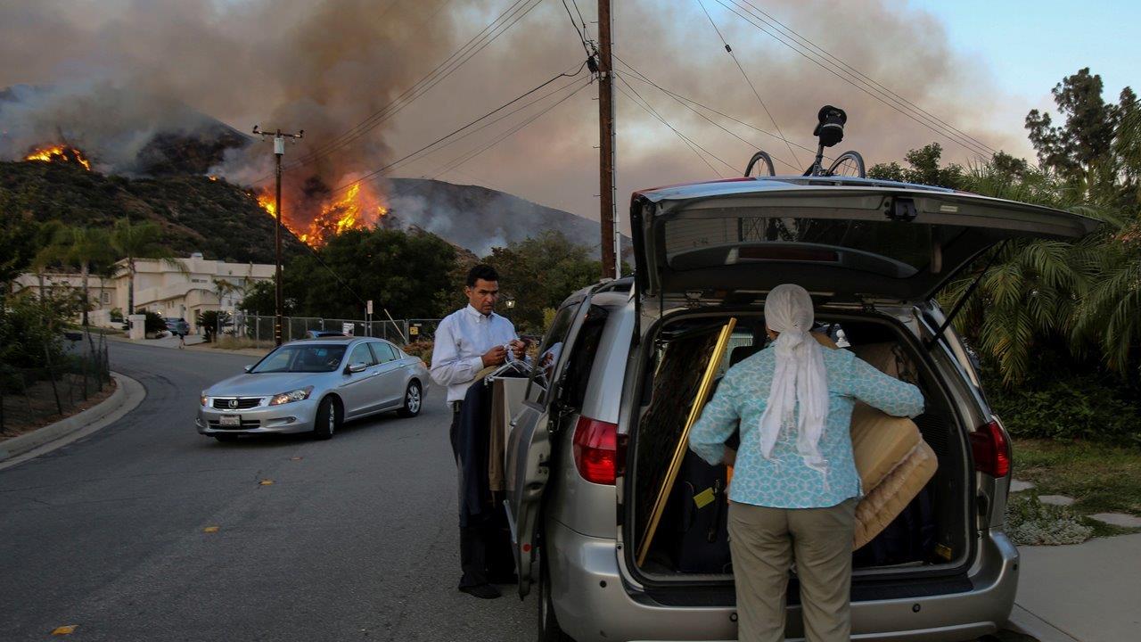 Wildfires force widespread evacuations across California