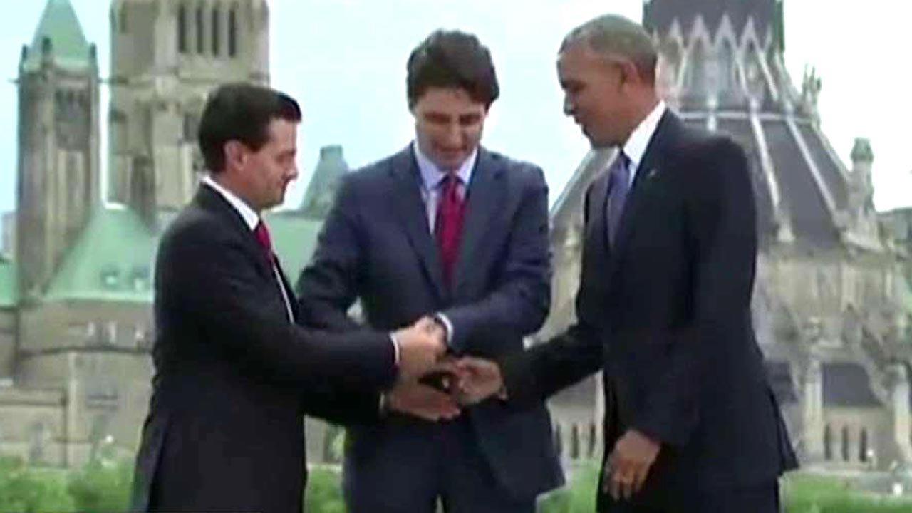 Kennedy's Topical Storm: Obama's Awkward Handshake