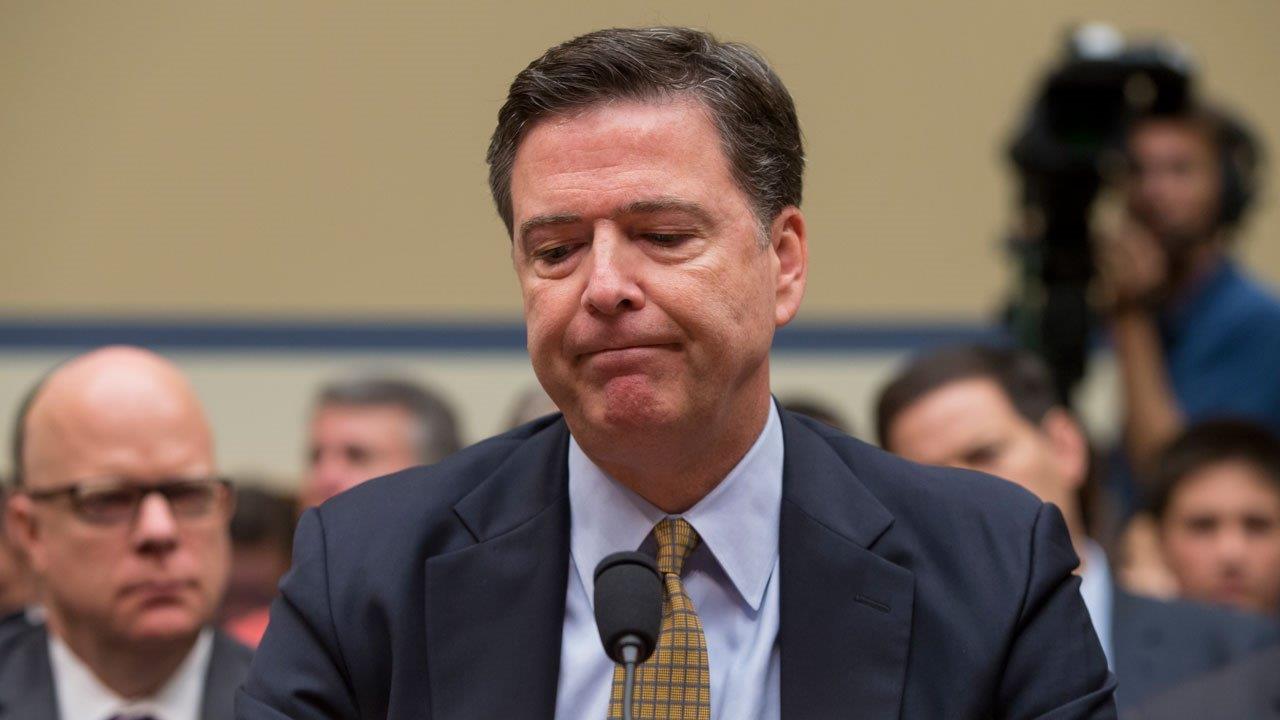FBI boss questioned by House committee over Clinton decision