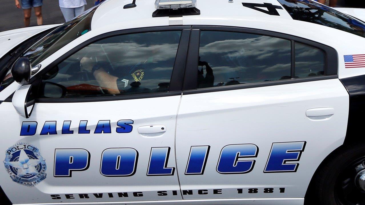 Dallas police downloading officer's body camera footage