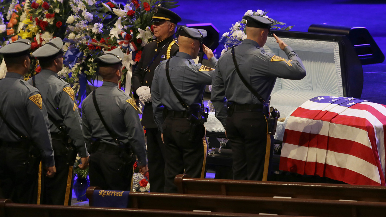 Hundreds mourn slain Dallas officers at funeral services
