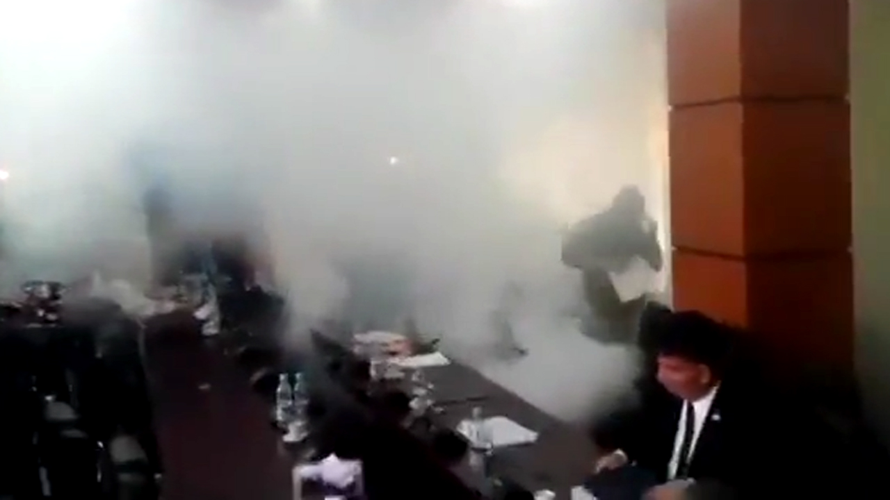Politician sets off tear gas to block parliament border vote