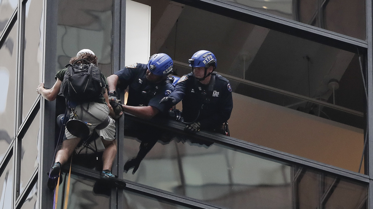 Police grab climber from side of Trump Tower 