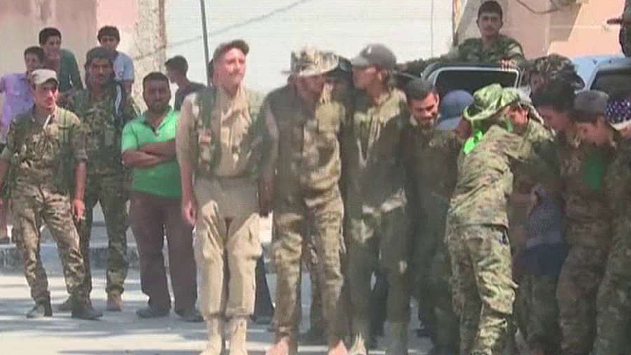Civilians celebrate liberation of Manbij, Syria 