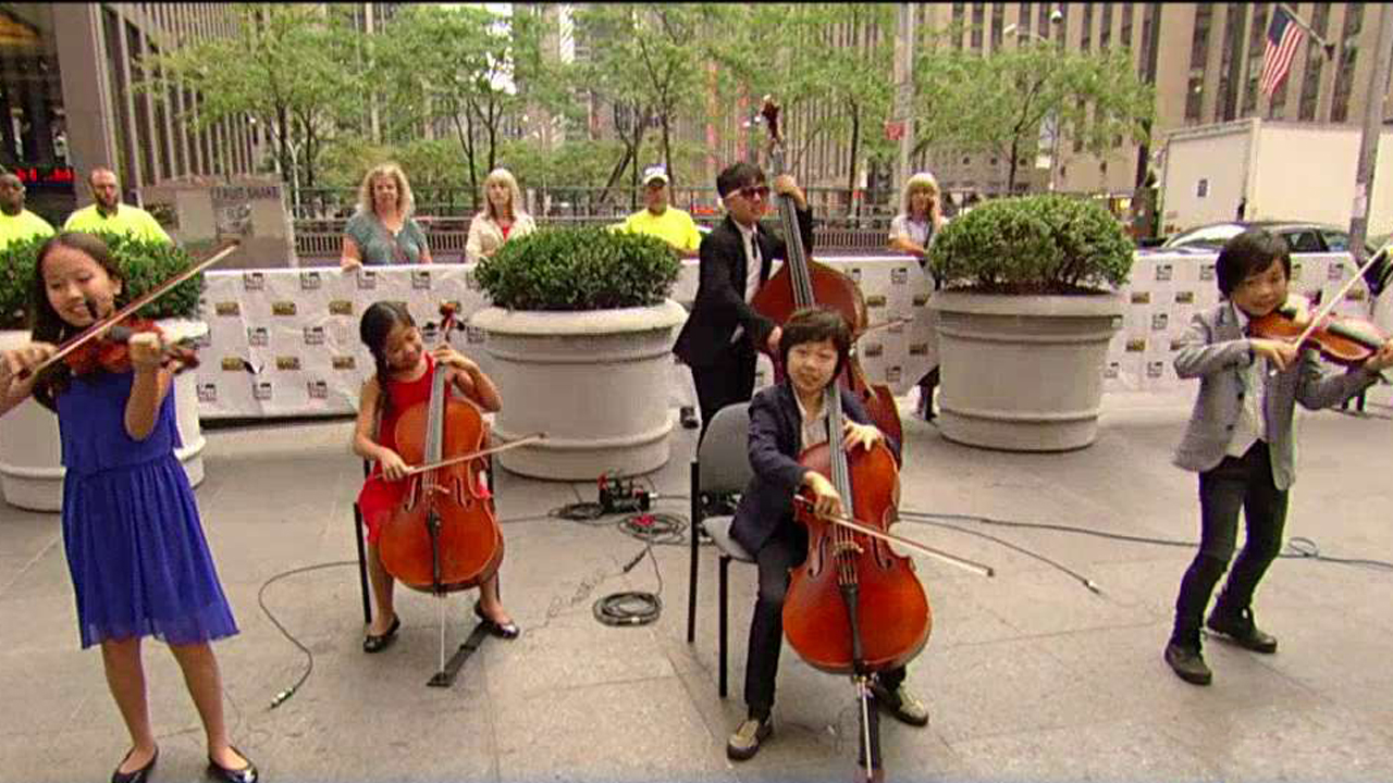 Pint-sized musicians from the Joyous String Ensemble