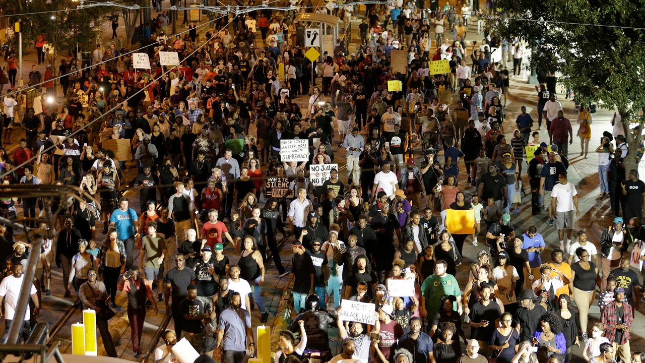 How should Charlotte police handle the protests?