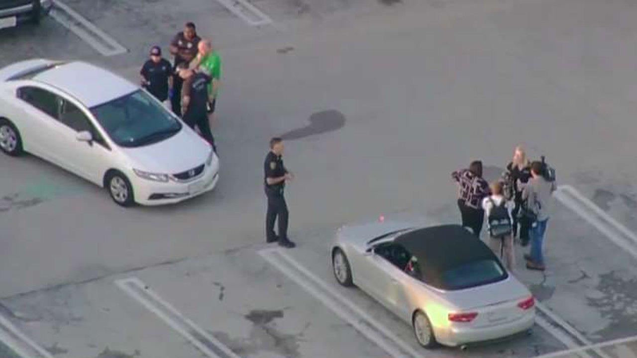 Shooter opens fire at Houston shopping center