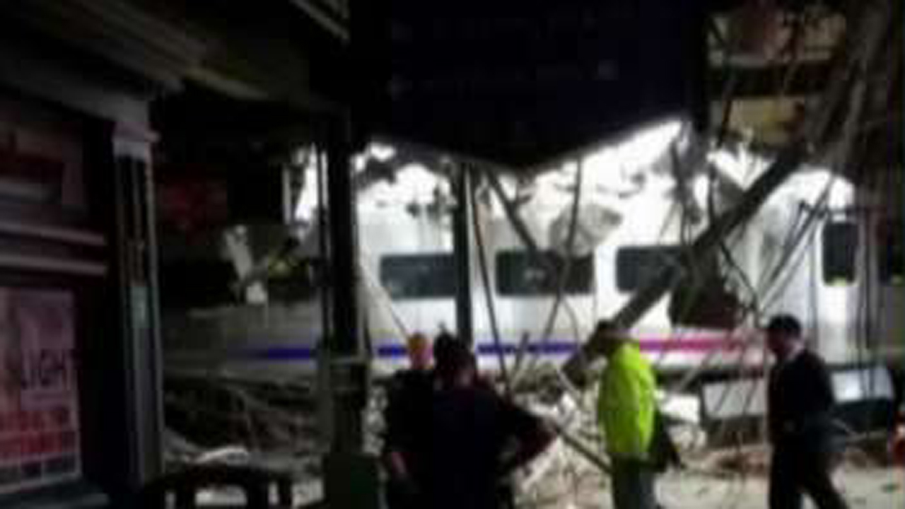 Reports of people trapped in debris from NJ train crash