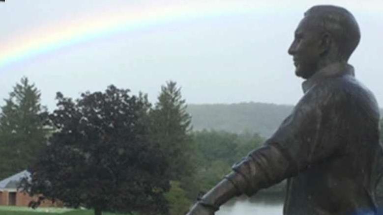 Rainbow appears over Arnold Palmer statue 