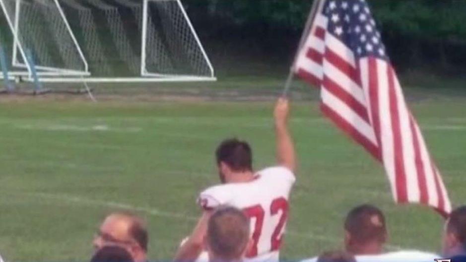 High school football player's patriotism goes viral