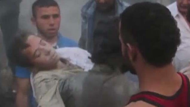 Video shows boy pulled from rubble in Aleppo 