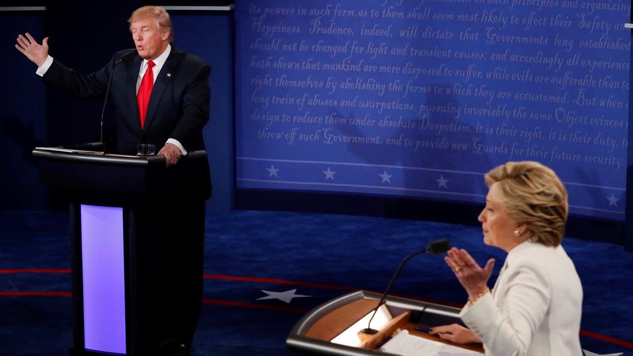 Grading the candidates on economy, foreign policy