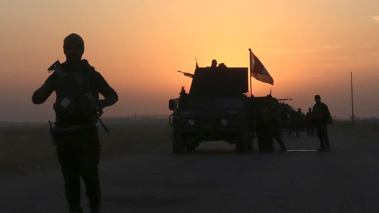 Report: Iraqi forces retake town 9 miles east of Mosul
