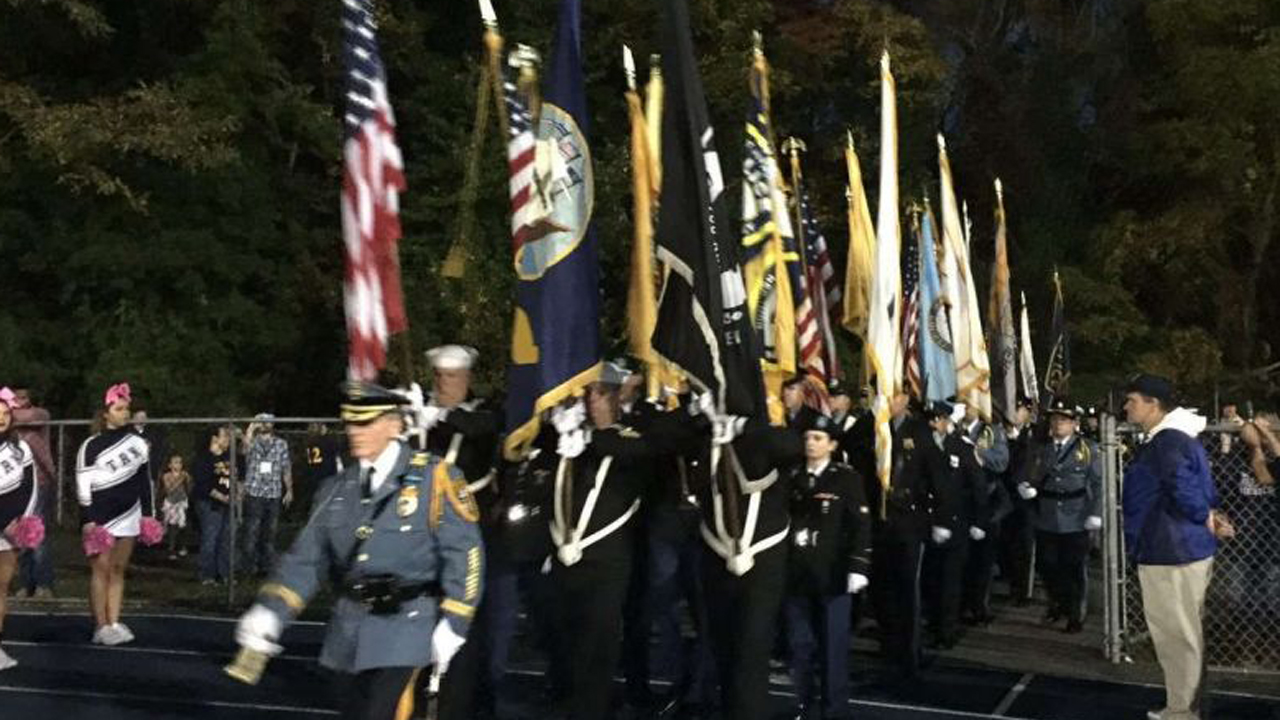 High school under fire for police, military honor ceremony 