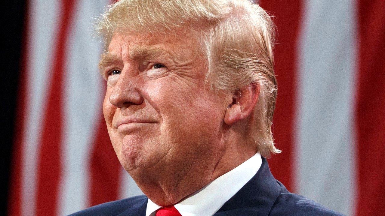 Trump accuses media of running 'phony polls' 