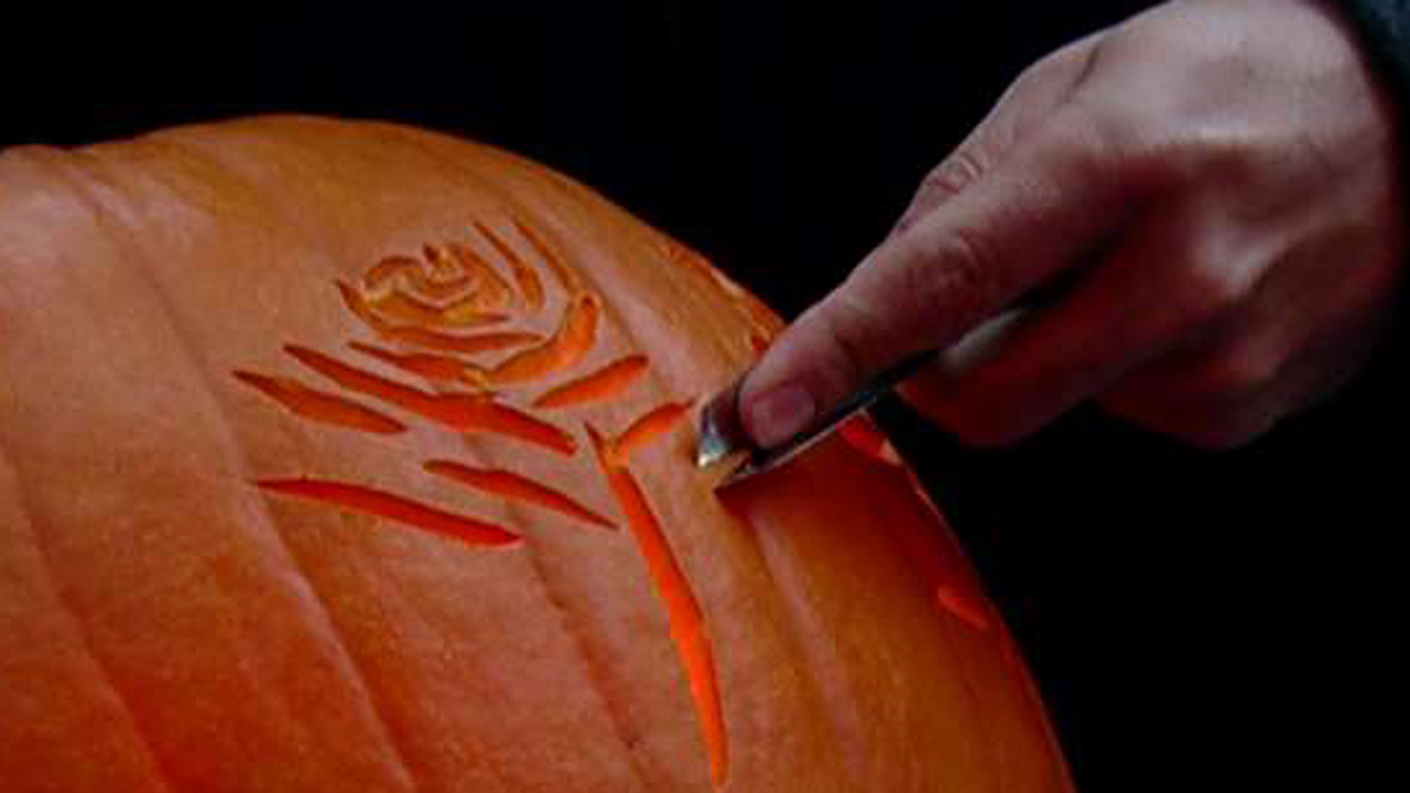 Adam Klotz shows off his pumpkin carving skills 