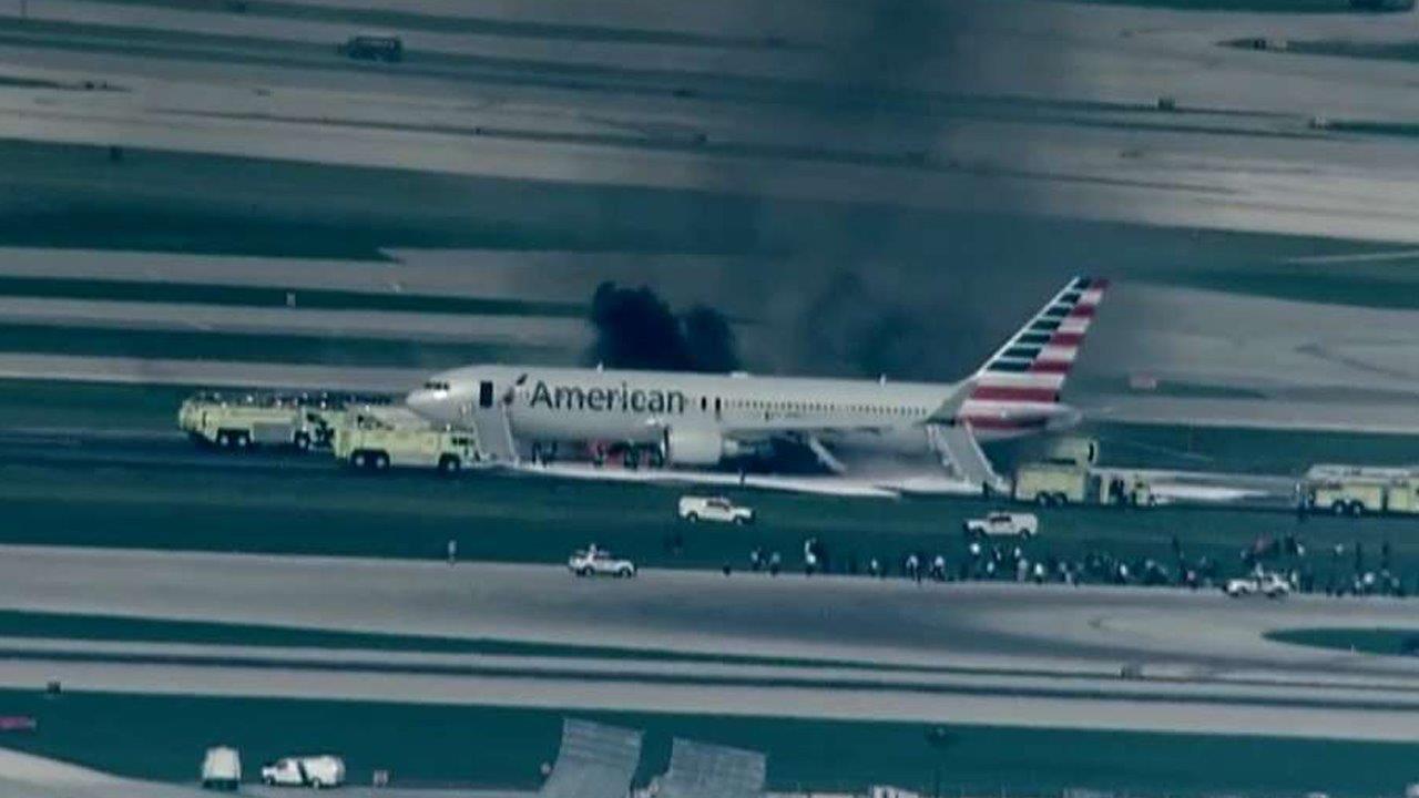 Jet blows tire, aborts takeoff, catches fire in Chicago
