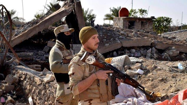 Iraqi troops push inside the city limits of Mosul