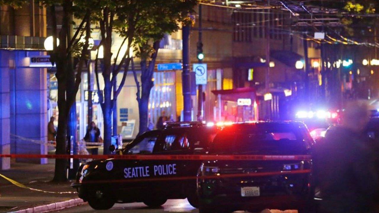 Manhunt for gunman after five shot in Seattle