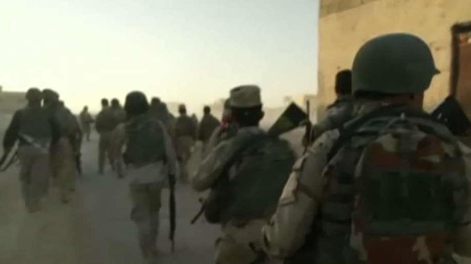 Iraqi forces advance into Mosul under heavy fire