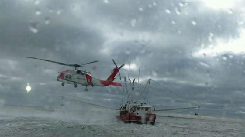 Coast Guard pulls fishing crew from sinking ship