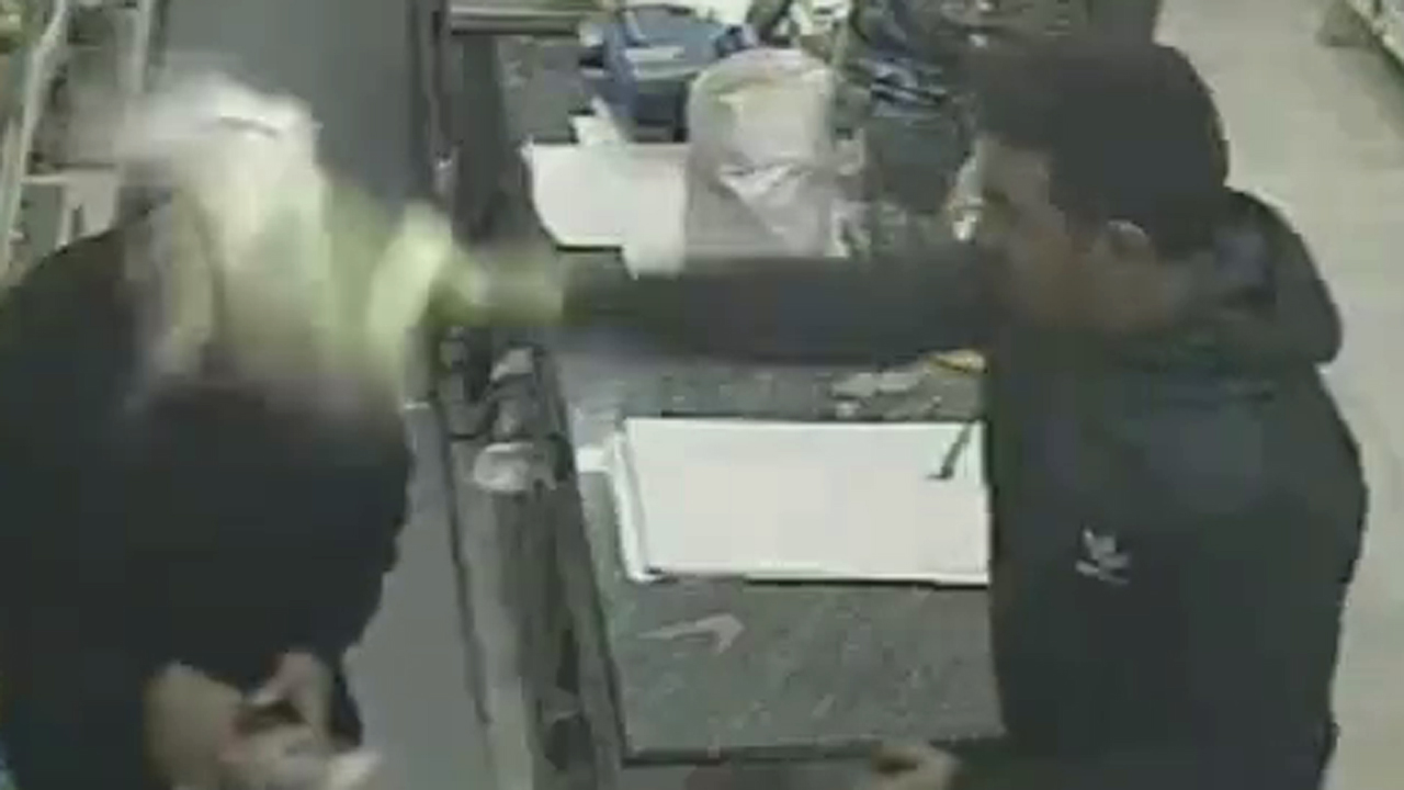 Bottle smashed over clerk's head in shocking robbery