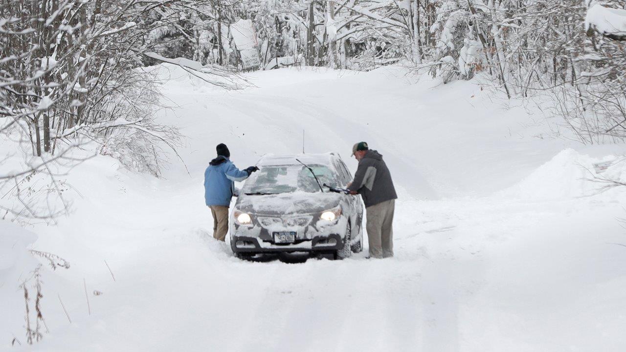 Residents dig out after season's first major snowstorm 
