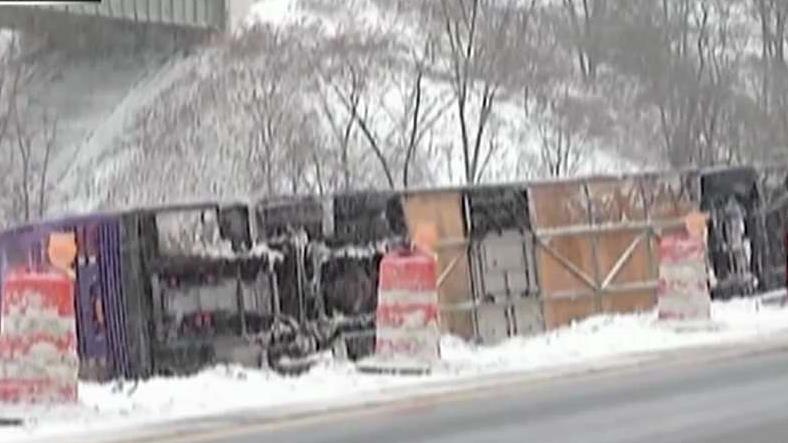 Bus packed with students flips on icy road in New York 
