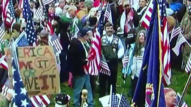 Backlash after college decides to remove American flags