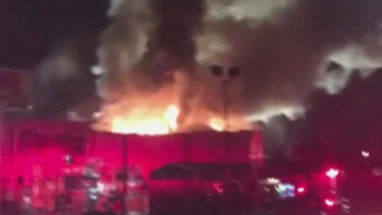 Fire rips through Oakland warehouse during party