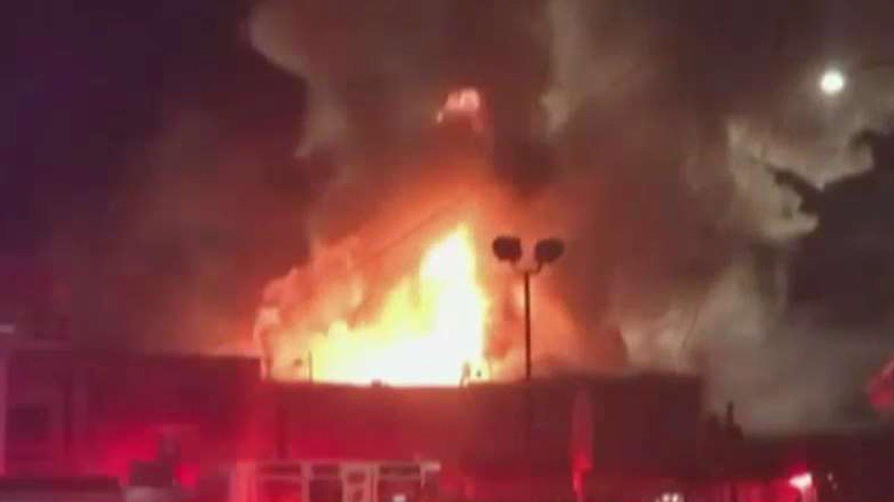 Dozens unaccounted for after deadly warehouse fire 