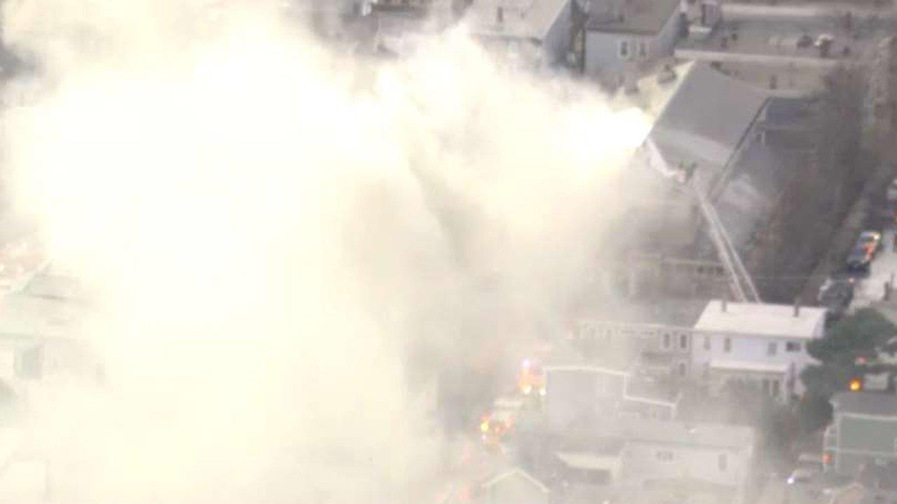Firefighters battle 9-alarm fire in Cambridge, Massachusetts