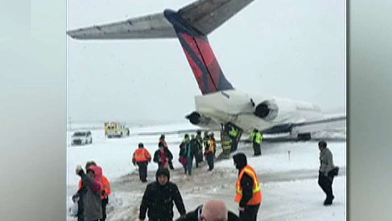 Massive snowstorms ground flights across Midwest, Northeast