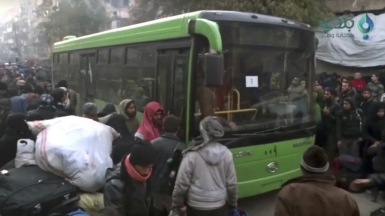 Syrian cease-fire holds as civilians work to evacuate Aleppo