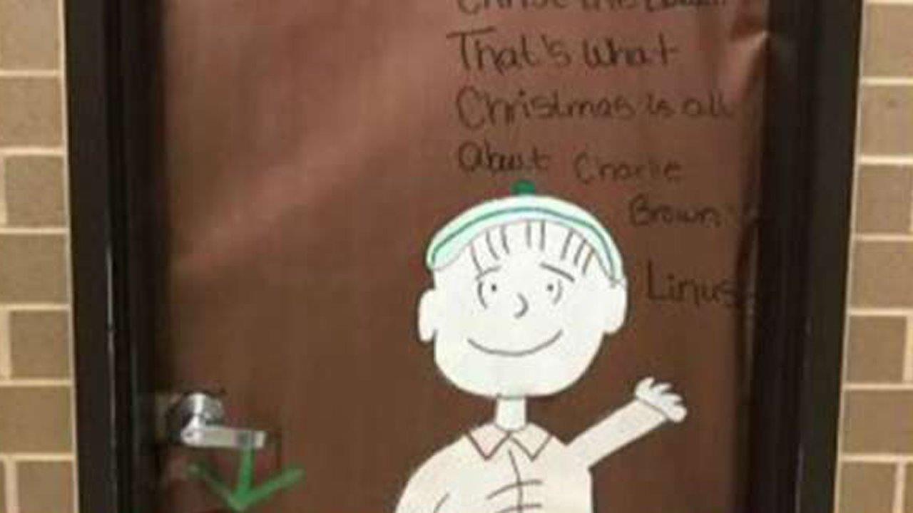 Judge: Teacher can display 'Peanuts'-themed Christmas poster