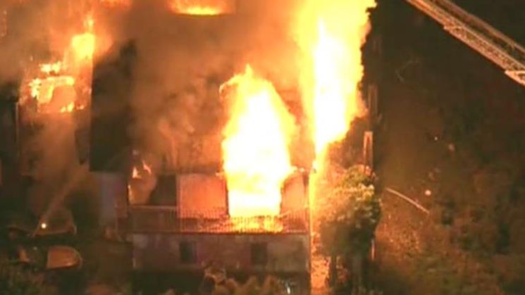 Firefighters respond to massive house fire in California