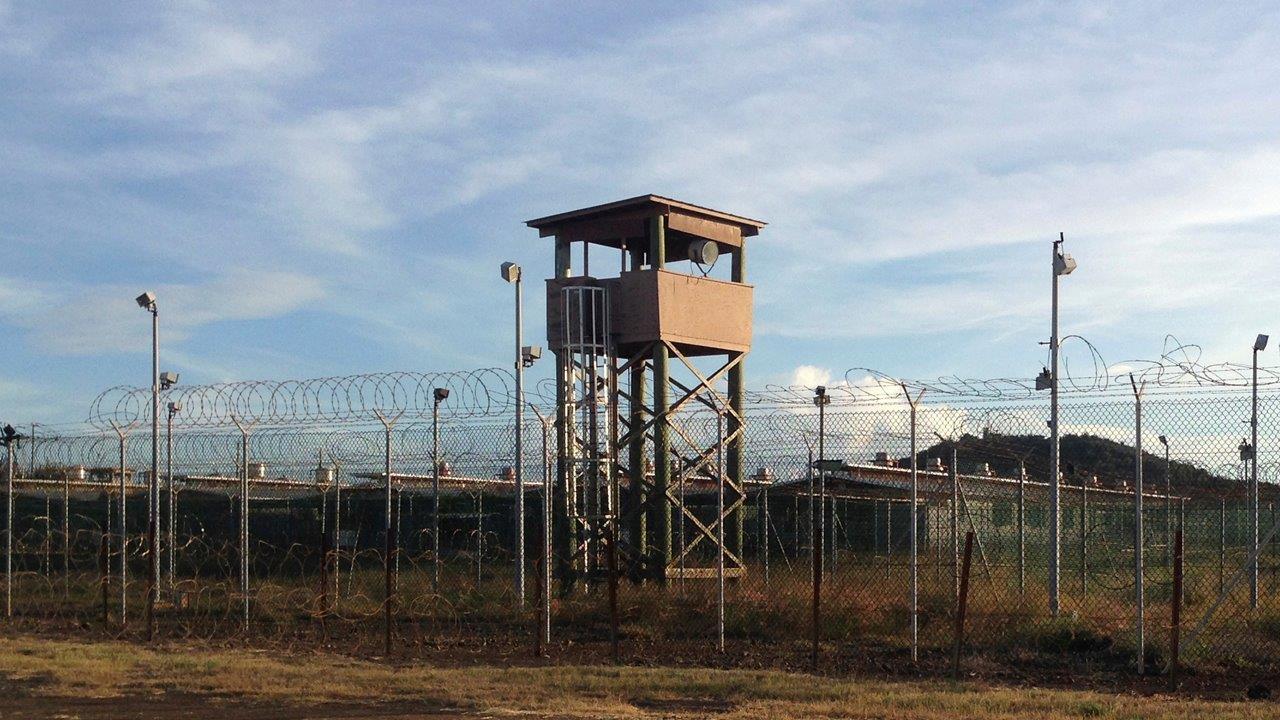 Report: Obama to transfer Gitmo detainees, despite attacks