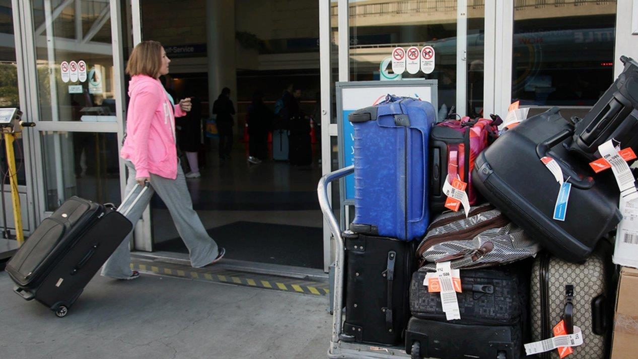 Spirit, United Airlines charge fees for carry-on bags