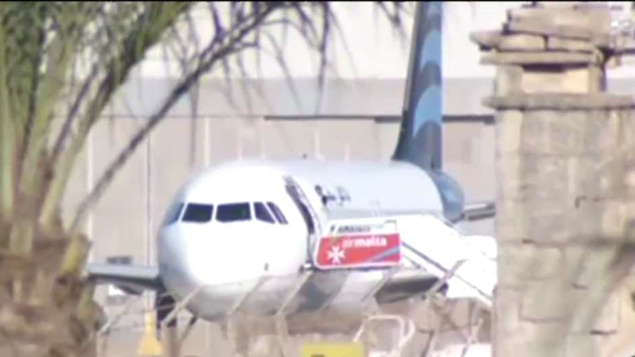 Hijacking suspects reportedly letting passengers off plane