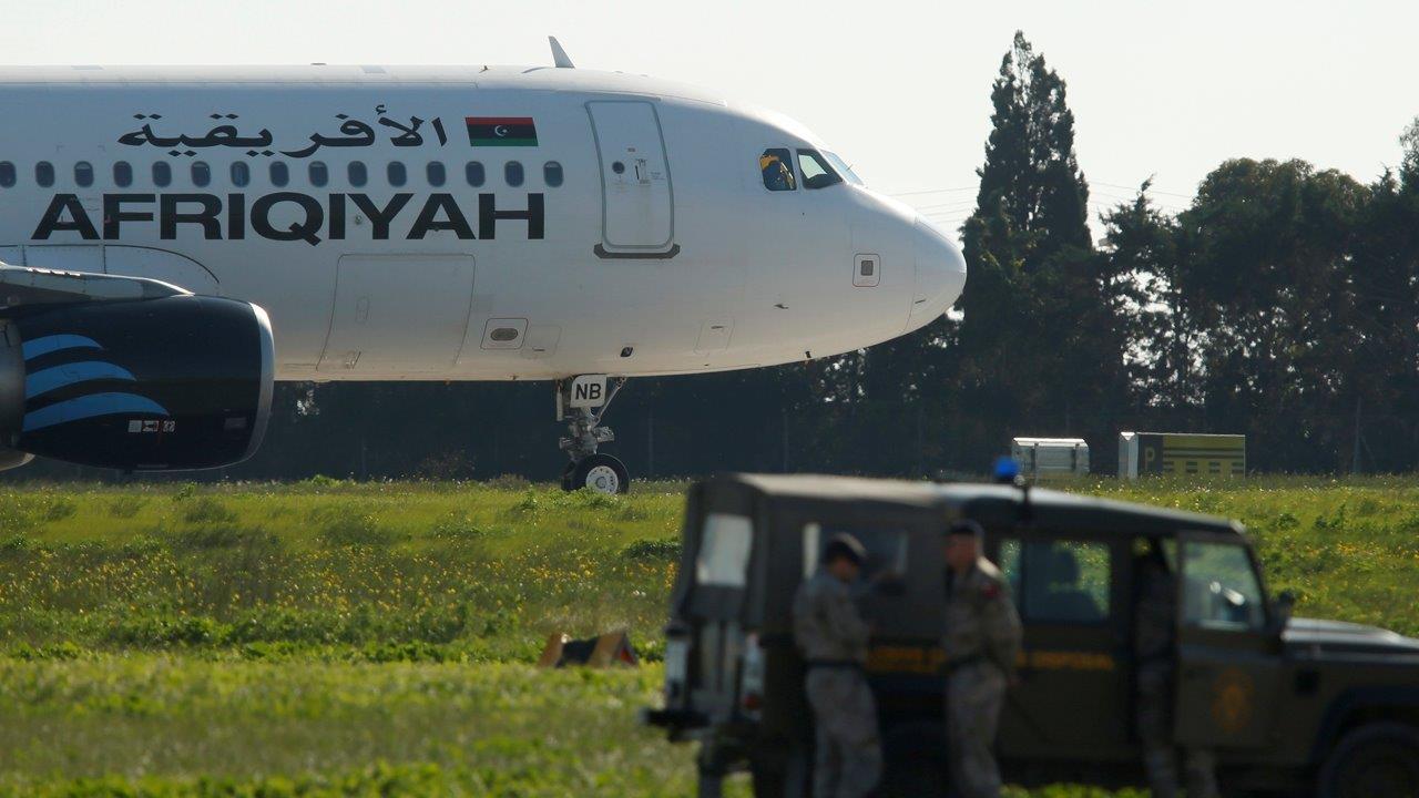 Hijackers of Libyan airplane surrender after standoff