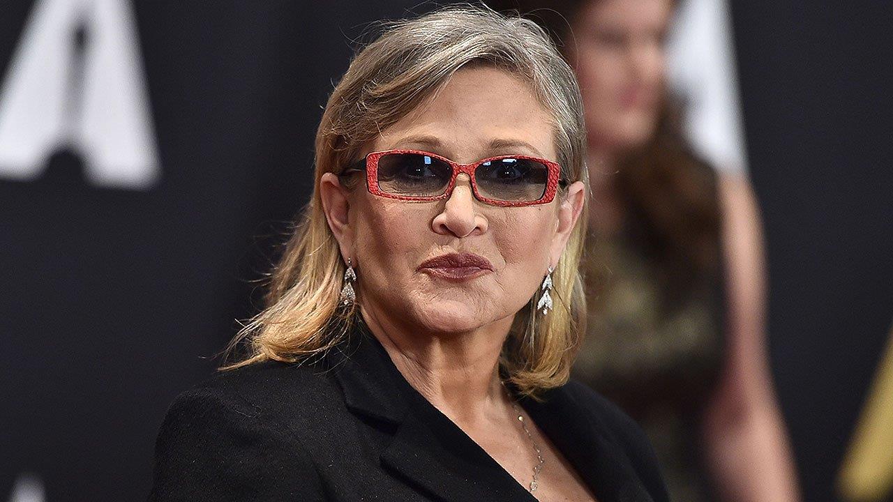 Reports: Carrie Fisher suffers heart attack on flight 