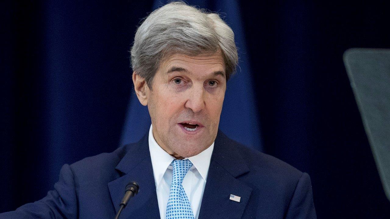 Kerry defends decision to let UN resolution pass