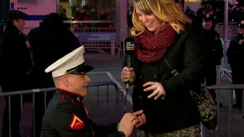 US Marine surprises girlfriend with proposal 